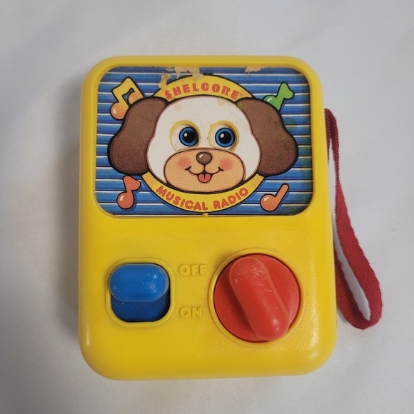 Vintage 1990 Shelvore Musical Wind Up Radio Lullaby Toy Puppy Yellow - Picture 1 of 8